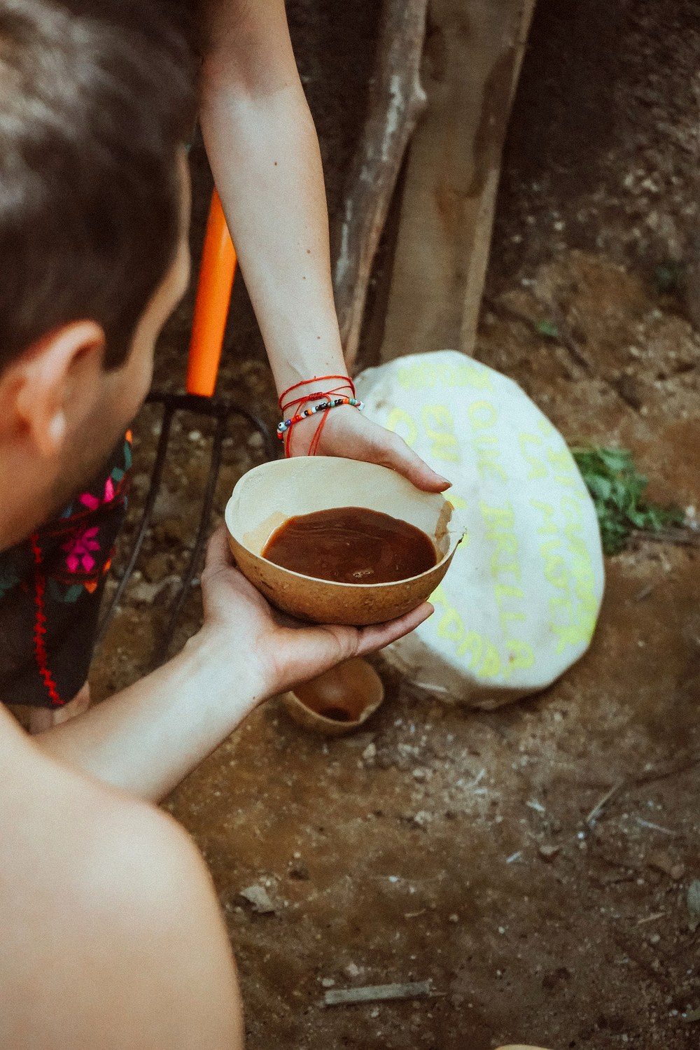 Cacao being shared in a jicara